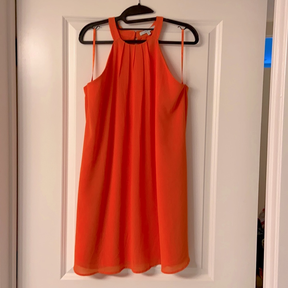 Orange, loose-fitted dress